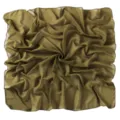 Close-up detail of the olive green chiffon square scarf showing soft texture and fine rolled hem. - Cactus Green