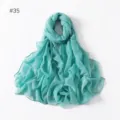 Turquoise lightweight solid color long scarf detail view, elegant drape and soft fabric texture. - 35