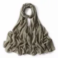 Detail view of solid color pearl chiffon long scarf with delicate gold flecks, sage green. - 6# Pine Needle