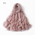 Close-up detail of soft solid color pink scarf fabric, lightweight drape texture background. - 41