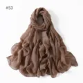 Detailed view of the solid brown lightweight polyester voile long scarf and elegant shawl. - 53