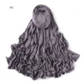 Detailed shot of a solid color modal jersey long scarf, showing soft draped fabric texture. - Size 6