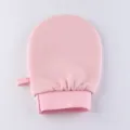 Pink exfoliating bath mitt with elastic cuff and hanging loop, premium texture for daily use. - Pink