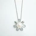 Close-up detail of silver chain necklace with a pearl flower pendant and shimmering petals. - Pendant Only (Without Chain) / Acrylic Beads / Silver