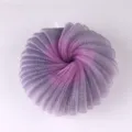 Detailed close-up of the dual-color gradient mesh shower sponge with a hanging loop. - Purple