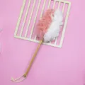 Long wooden handle bath brush with pink and white mesh sponge for daily body cleaning and spa. - Pink White