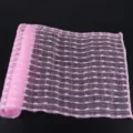 Pink white mesh bath scrubber exfoliating back towel detail view for daily bath cleaning. - Pink