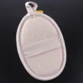 Natural loofah bath sponge detail view, beige edged scrubbing pad with elastic strap and loop. - Large Long Tail Style / 10x14.5cm