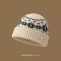 100% wool knit beanie winter hat with classic Fair Isle snowflake pattern and ribbed cuff. - One Size / Pearl White