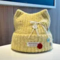 Yellow knitted cat ear beanie hat for women, cute winter warm wool skull cap with bow. - Adjustable / Yellow
