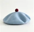 Light blue wool beret hat with dark red pom-pom stylish warm winter headwear accessory - M (56-58cm) / Light Blue