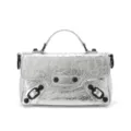 Silver metallic leather motorcycle handbag with stylish studs and top handle for women. - 20x8x13cm / Silver