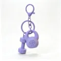 Mini fitness equipment keychain detail shot, purple kettlebell and dumbbell hanging ornament. - Purple