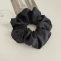 Elegant black satin hair scrunchie, large floral ponytail holder for women's daily styling. - Black