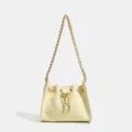 Borsa a secchiello in pelle trapuntata gialla con catena dorata, elegante borsa a spalla. - Giallo