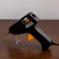 Electric hot melt glue gun 20W for DIY crafts and household repairs with metal stand. - Glue Gun One Piece