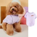 Pet fleece sweatshirt detail showing soft purple fabric texture and classic leather brand patch label. - XXS / Violet