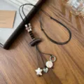 Collier long style Zen avec perles en bois et pendentifs étoile cœur coquillage rétro - Collier Étoile Cœur