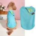 Pet vest detail showing blue sleeveless dog clothes with cute camera print and soft fabric close up - XS / Blue