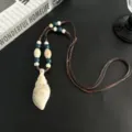 Collier pendentif coquillage style ethnique rétro avec perles pour femmes bijoux chic - Collier Conque