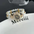 Elegante reloj de cuarzo de perlas de doble fila con esfera de flor de estrás. - Negro