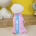 Detail view of the pink fleece pet jumpsuit showcasing the back stripe and cozy texture for cold days - Pink