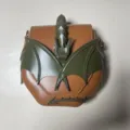 Stylish brown and green cross-body bag featuring unique 3D dragon wing and tail design. - Brown and Green