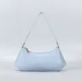 Light blue minimalist leather underarm bag detail, sleek minimalist shoulder bag design. - Blue