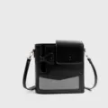 Black crossbody shoulder bag with unique flap pocket bow design and rose gold hardware stylish. - Black