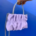 Purple gathered cloud handbag with dazzling rhinestone top handle and chic silver chain. - Purple