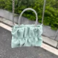 Macaron green ruched cloud mini bag with sparkling rhinestone handle and elegant silver chain strap. - Green