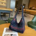Retro women woolen striped shoulder bag, large capacity casual commuting tote bag for daily use. - Striped Blue