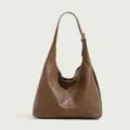 Brown PU leather shoulder bag detail, slouchy hobo design with adjustable strap and seam. - Khaki