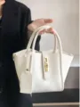 White lychee pattern soft leather handbag, stylish bucket bag with metal lock closure. - Off White