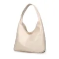 Detailed view of beige soft leather shoulder bag, large capacity hobo style with wide strap. - White