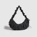 Black and white polka dot hobo dumpling bag with ruffled strap for women daily casual commute. - Black Pleated Dumpling Bag