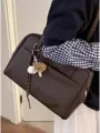 Brown retro large capacity shoulder bag detail view showcasing unique baseball charm accessory. - Coffee (No Charm)