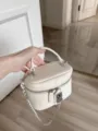 White pebbled leather vanity bag with top handle and silver chain strap stylish box handbag - Off White