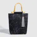Retro Chinese style bamboo handle handbag with leaf pattern tassel pendant elegant versatile bag. - Black Handbag