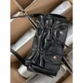 Black shiny pleated multi-pocket shoulder bag with cute drawstrings, stylish crossbody design. - Black
