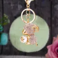 Fluffy green pom pom keychain with sparkling rhinestone ram holding crystal charm metal ring. - White Sheep + Mint Green Pom Pom