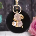 Cute rhinestone ram plush keychain with fluffy black pom pom and metal ring for bag. - White Sheep + Black Pom Pom