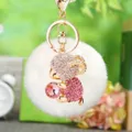 Rhinestone sheep bag charm close up, sparkling crystal cute ram keychain detail view. - Pink Sheep + White Pom Pom