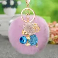Cute plush pom pom keychain with rhinestone sheep and blue crystal ball for women and bags. - Blue Sheep + Violet Pom Pom