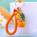 Cute orange persimmon metal keyring and bag pendant detail view, lovely lucky fruit charm gift. - Orange Rope + Good Luck Persimmon Orange