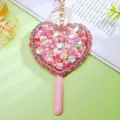 Detailed view of rhinestone heart flower mirror car keychain, cute bag pendant and charm. - Pink