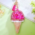 Detailed close-up of a sparkling pink rhinestone ice cream cone keychain with cute tassel. - Ice Cream Cone Style (A952) / Single Piece / Rose Red