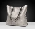 Vintage oil wax leather tote bag for women, large capacity stylish shoulder bag side view. - Gray