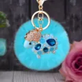 Cute fluffy blue sheep plush keychain with sparkling rhinestones and gold hardware for women bags. - Blue Rhinestone Sheep + Blue Plush Ball