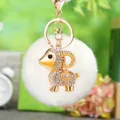 Cute rhinestone sheep plush keychain with fluffy pom-pom and gold metal ring pendant - Lucky White Sheep + White Plush Ball